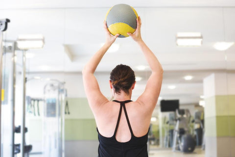 Exercising in the gym with a stressball